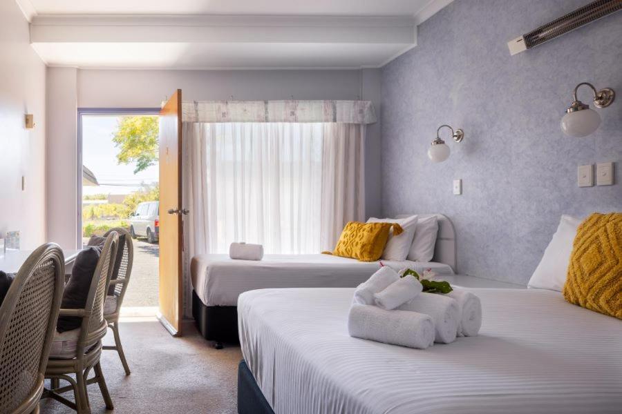 South Pacific Palms Motor Inn Tuncurry Extérieur photo